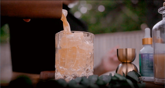 altarnative drops and long rhode elixir on top of a bar