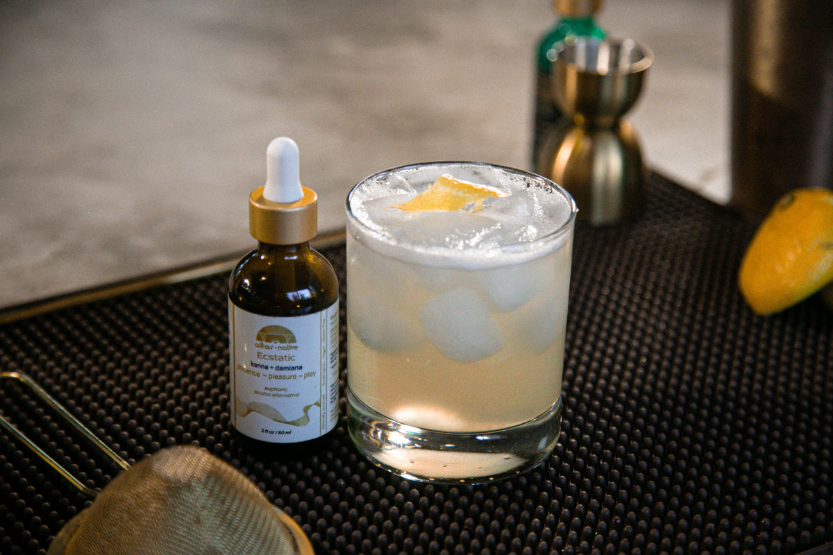 Building an herbal mocktail at the bar